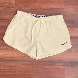 Nike yellow workout shorts